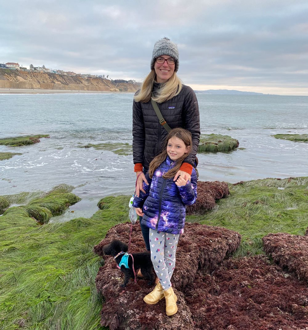 Kristin-Brinner-3Kristin Brinner with the Surfrider San Diego Chapter with her daughter standing at a tide pool