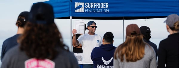 Eric explaining the importance of a beach cleanup.