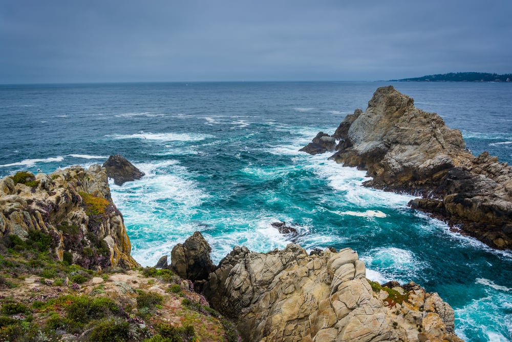 Large rocks and waves in the Pacific Ocean, seen from a beach at Point Lobos State Natural Reserve, in Carmel, California.-3