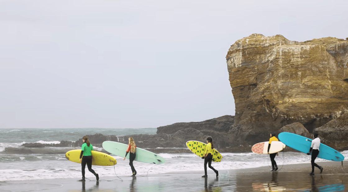 Photos of surfers on beach at Otter Rock, Oregon