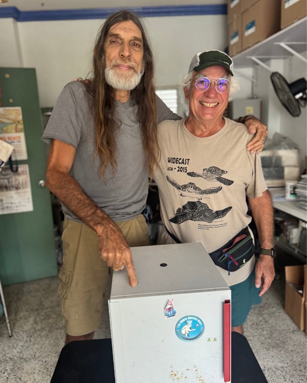 Rincón Chapter's Chair Steve Tamar (left) and Lopez (right) post in the BWTF lab.