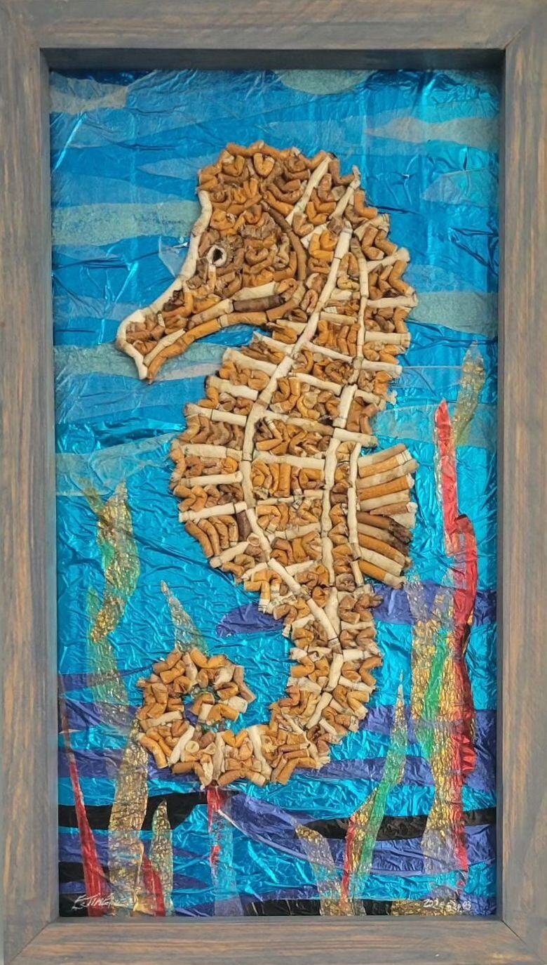 Seahorse made out of cigarettes.