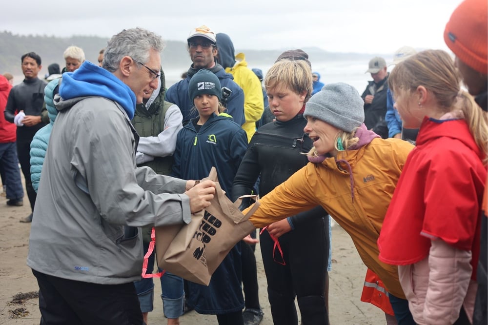 Vince working the raffle at a Surfrider event.