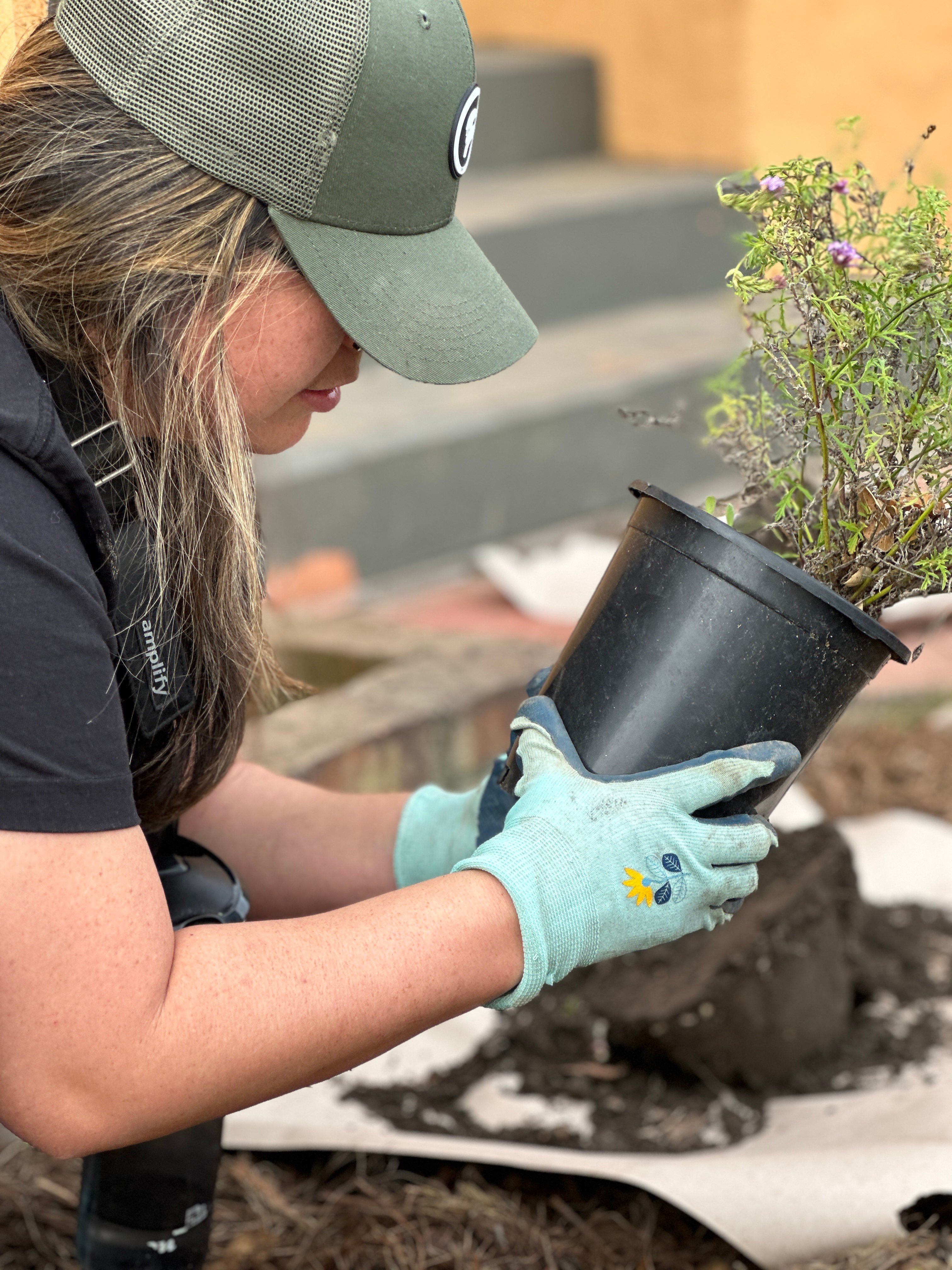 woman with container plant