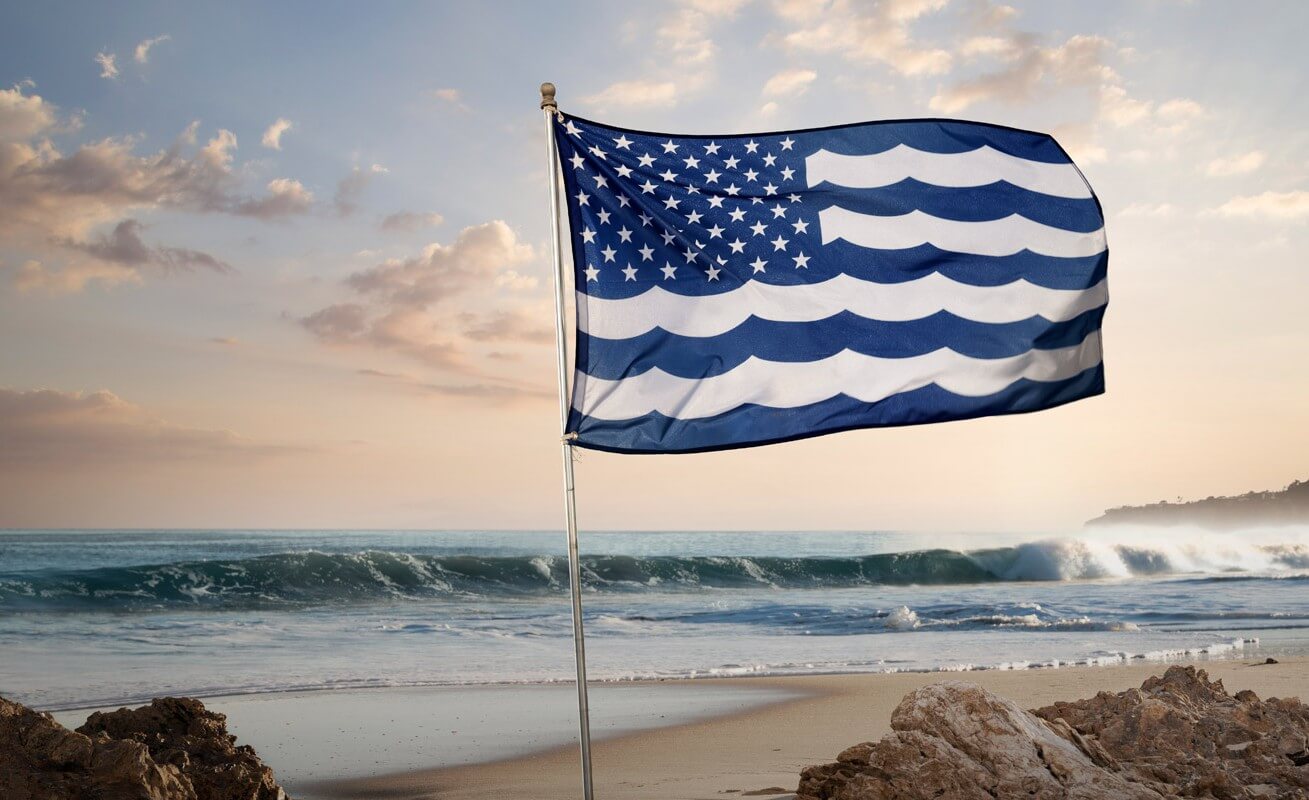 United States and Oceans of America flag on the beach